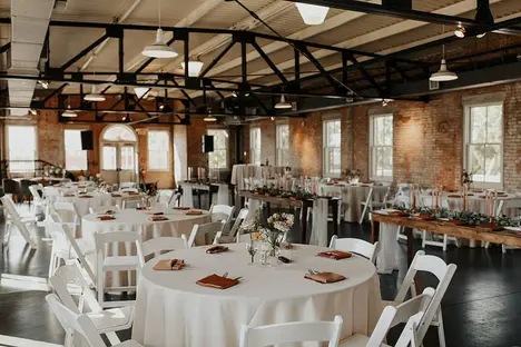 green grass field near body of water during daytime